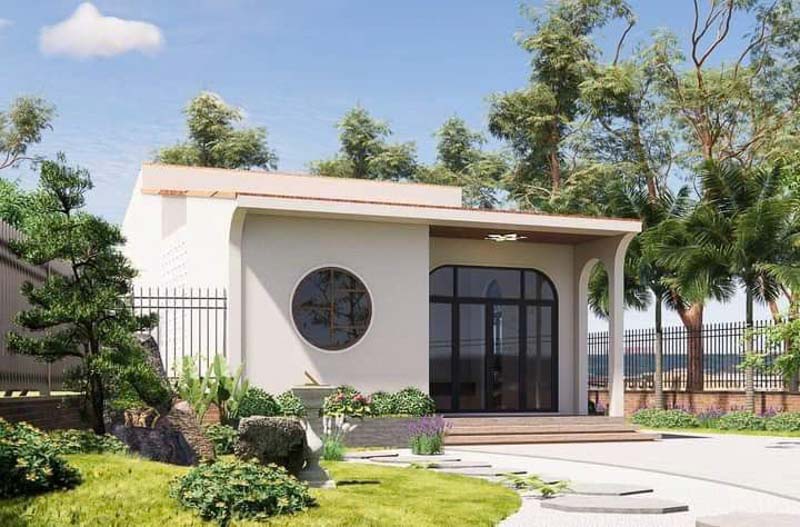 Ngôi nhà cấp 4 được cải tạo với kiến trúc hiện đại, nổi bật với ô cửa sổ tròn và cửa kính vòm lớn, chứng minh rằng gói sửa nhà cấp 4 100 triệu vẫn có thể mang lại một không gian sống thanh lịch và gần gũi với thiên nhiên