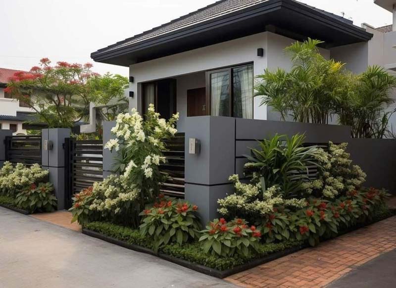 Mẫu thiết kế ngoại thất nhà cấp 4 sau khi sửa nhà cấp 4 100 triệu với mặt tiền hiện đại, cổng và tường rào tông xám sang trọng, kết hợp hài hòa với mảng xanh tươi mát.