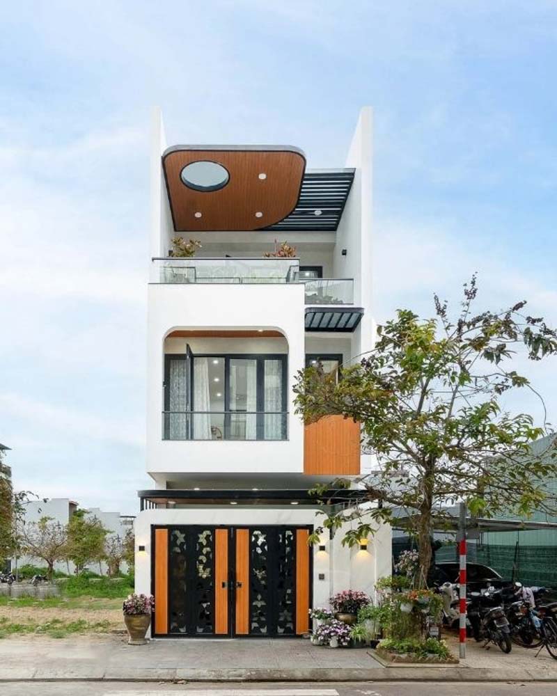 Kiến trúc nhà 2 tầng hiện đại với ban công độc đáo, minh chứng cho vẻ đẹp sau khi sửa nhà 2 tầng.